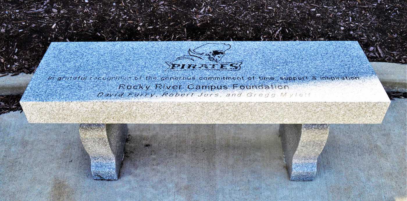 Engraved stone entrance signage at Rocky River High School